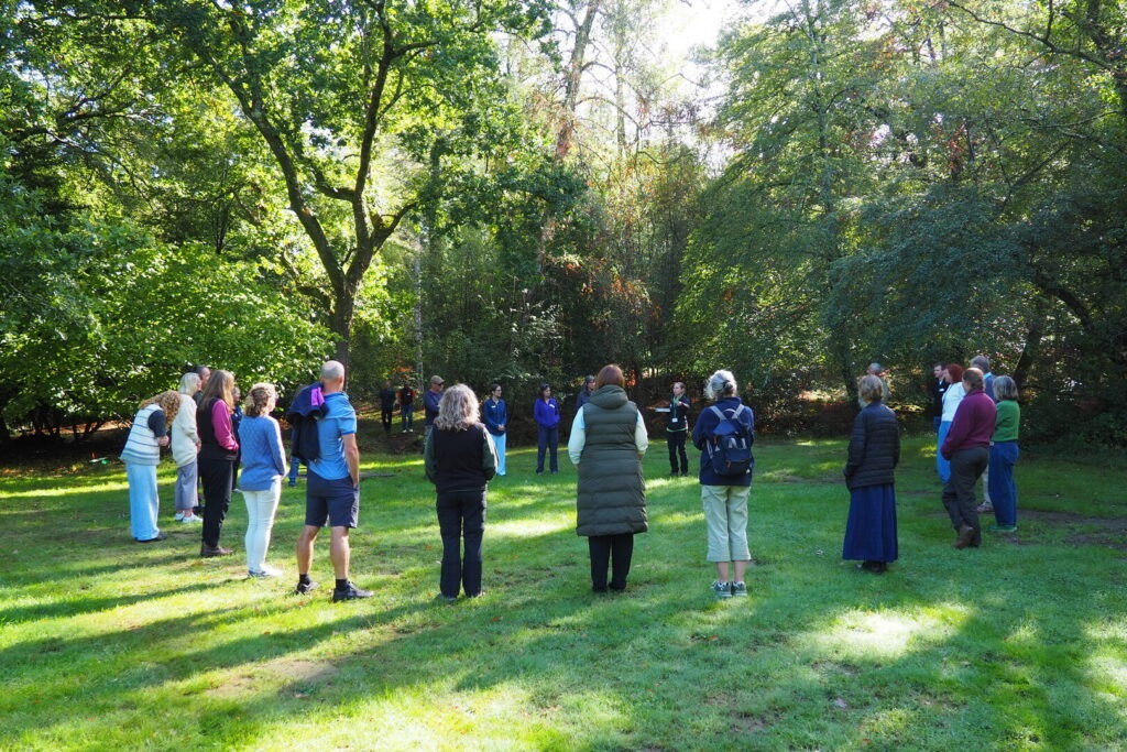 Attendees at the Green Health Hub's autumn Connect and Learn event take part in a mindful nature connection session.